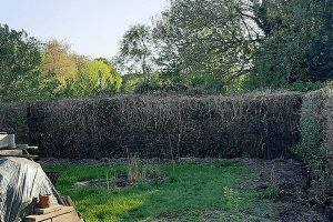 een oude afsluiting, tuinafbraak